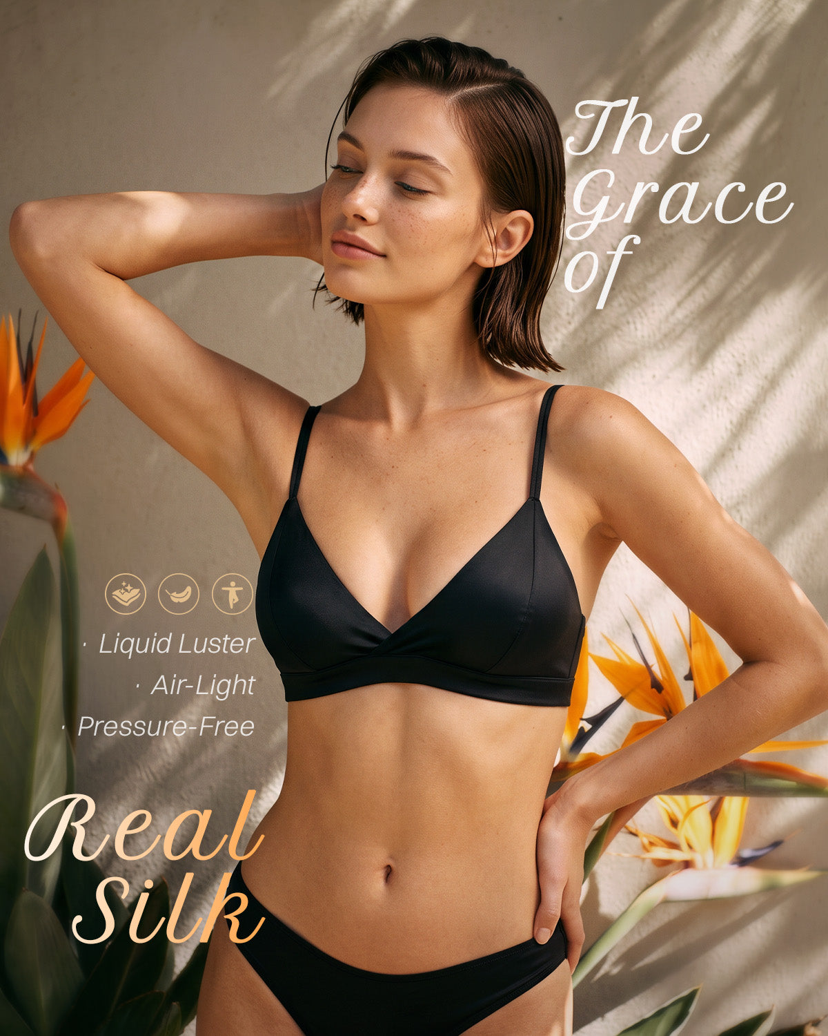 Black wireless silk triangle bralette styled on a model | FEELITS